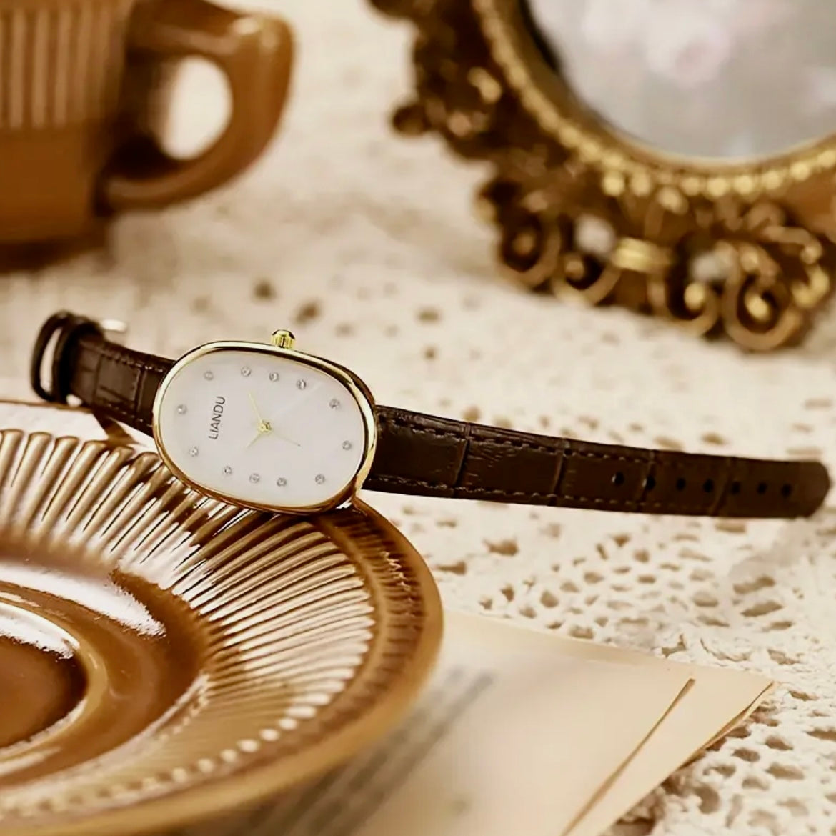 Black gold oval trending watch