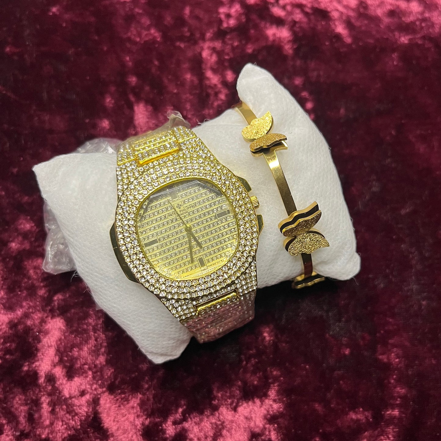 The gold butterfly watch pair