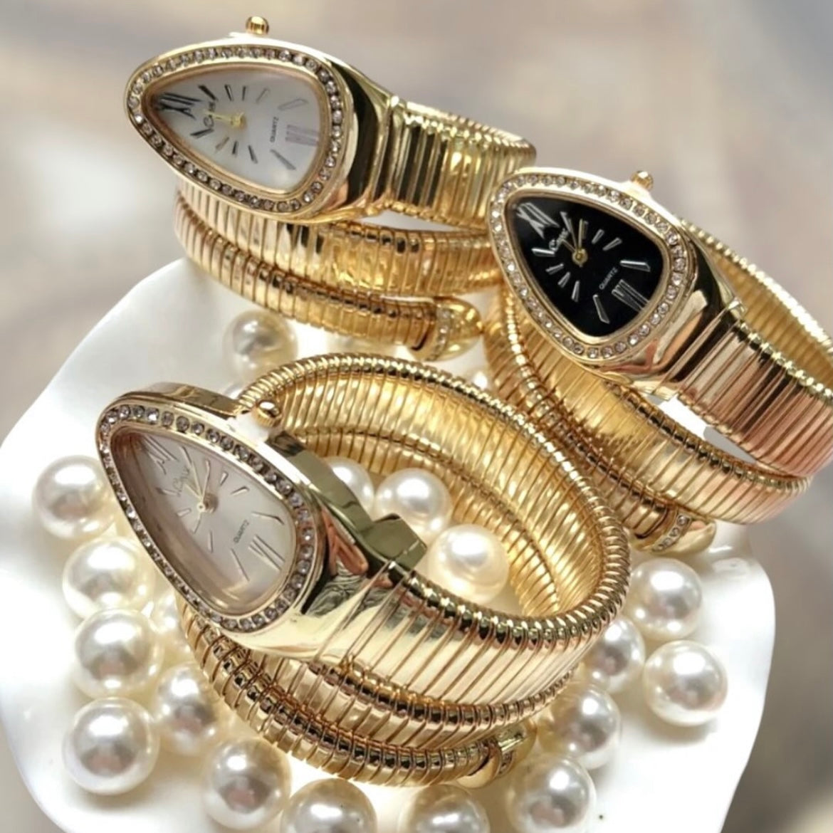 Golden bulgari snake watch