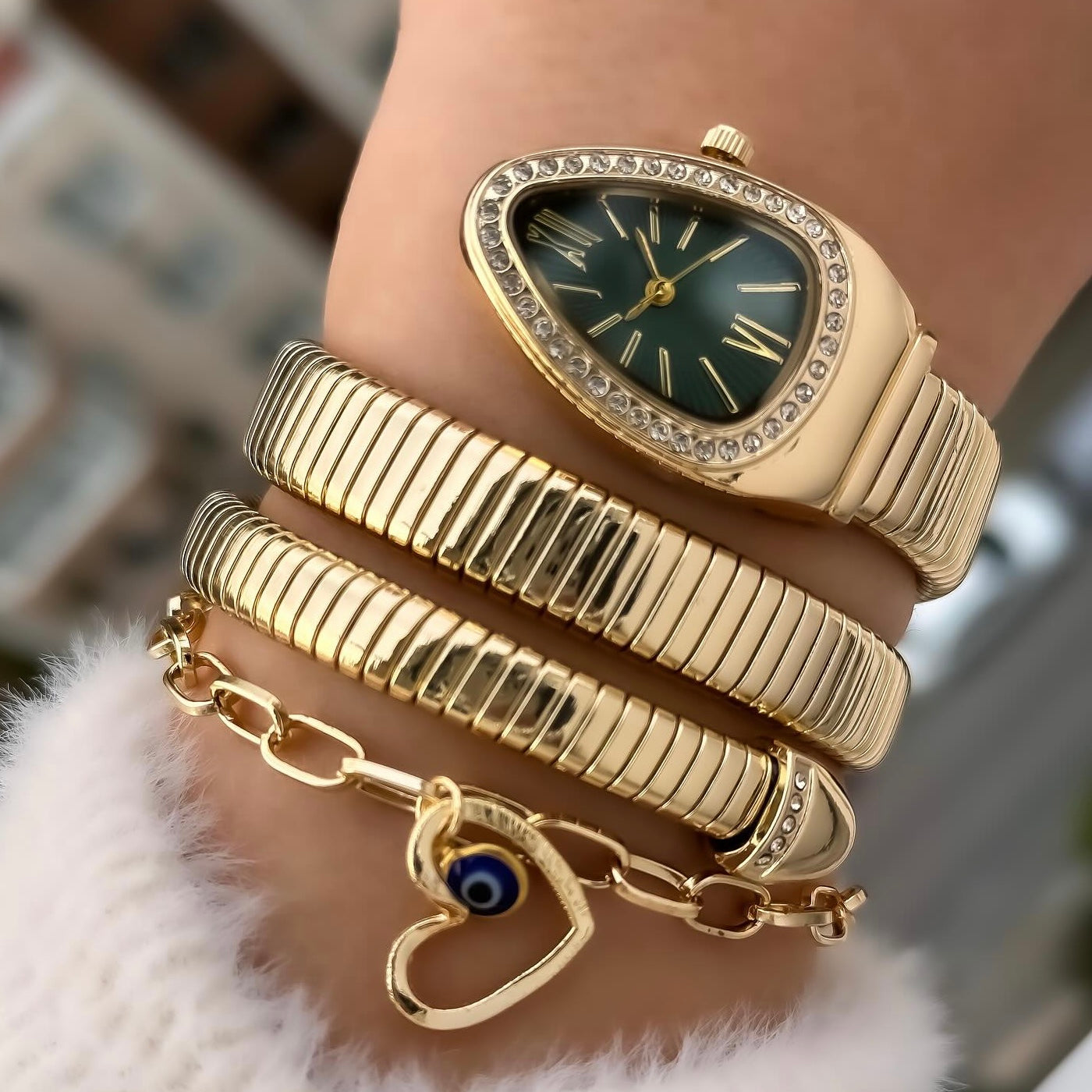Golden bulgari snake watch