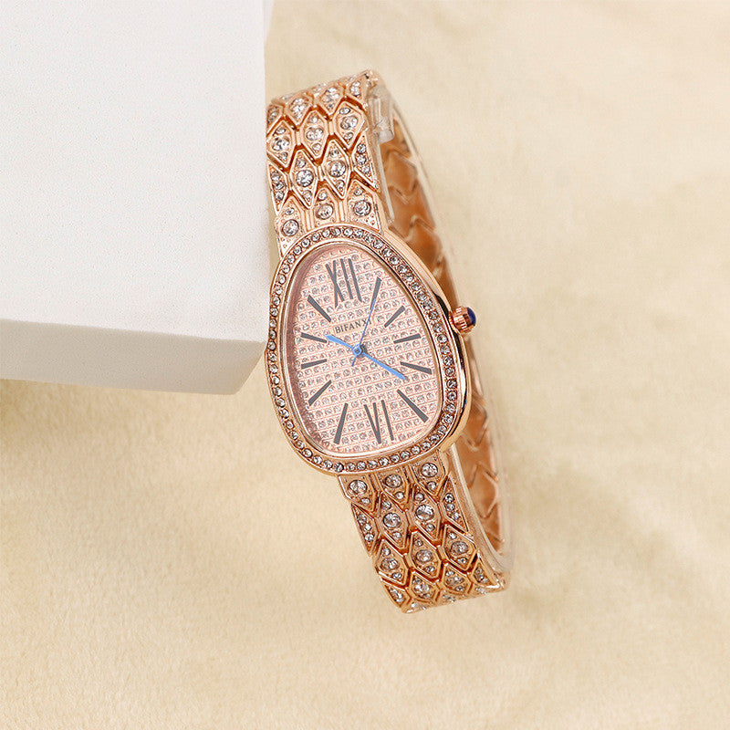 Rose gold snake egg watch
