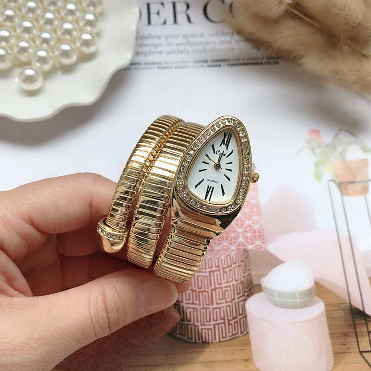 Golden bulgari snake watch
