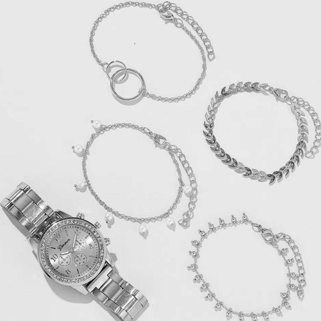 Watch and charm bracelet stack