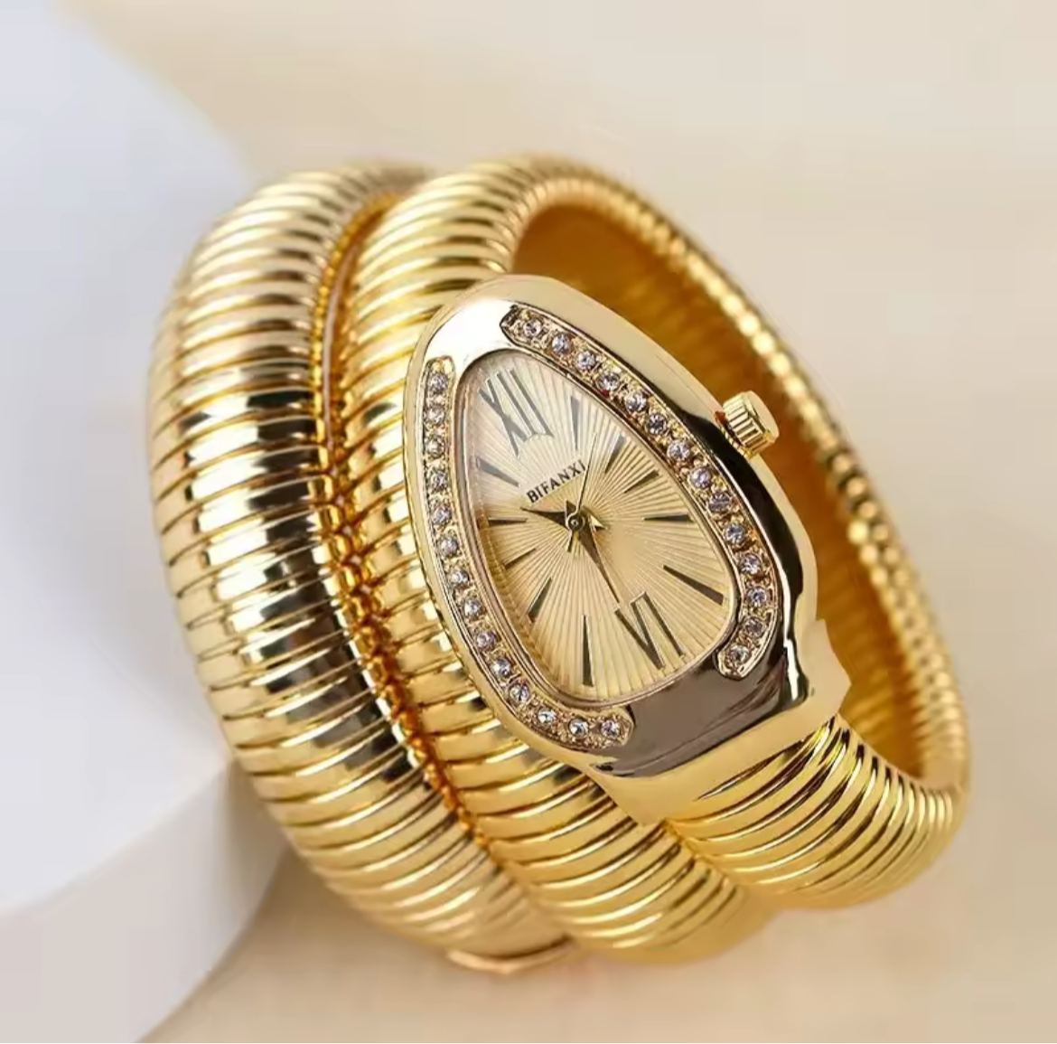 Golden bulgari watch