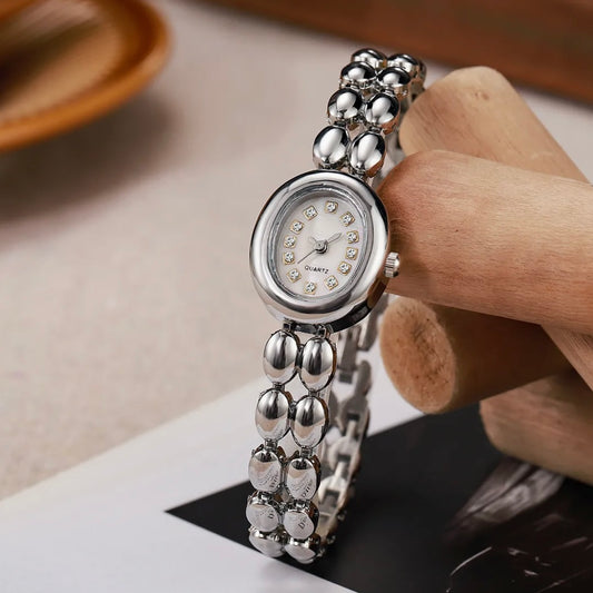 Silver oval grain watch