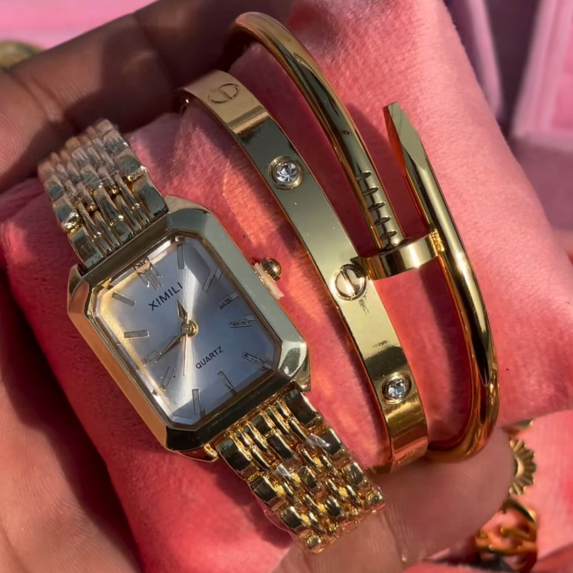 Cartier watch and bracelet stack